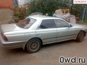 Битый автомобиль Nissan Laurel